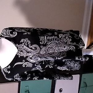 Chicos soft fabric top. Polyester and spandex fabric.